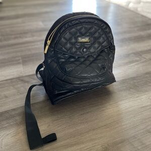 Tushbaby carrier, quilted black, with gold zipper, + extender band